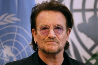 How did Bono start his music career?