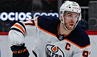 What is Connor McDavid doing outside the NHL?