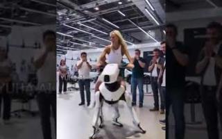 Girl riding a robot horse
